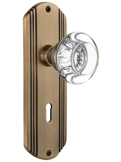 Streamline Deco Door Set with Round Crystal Glass Knobs and Keyhole in Antique Brass.